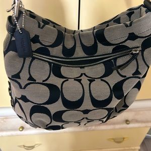 Classic black and grey Coach shoulder bag.